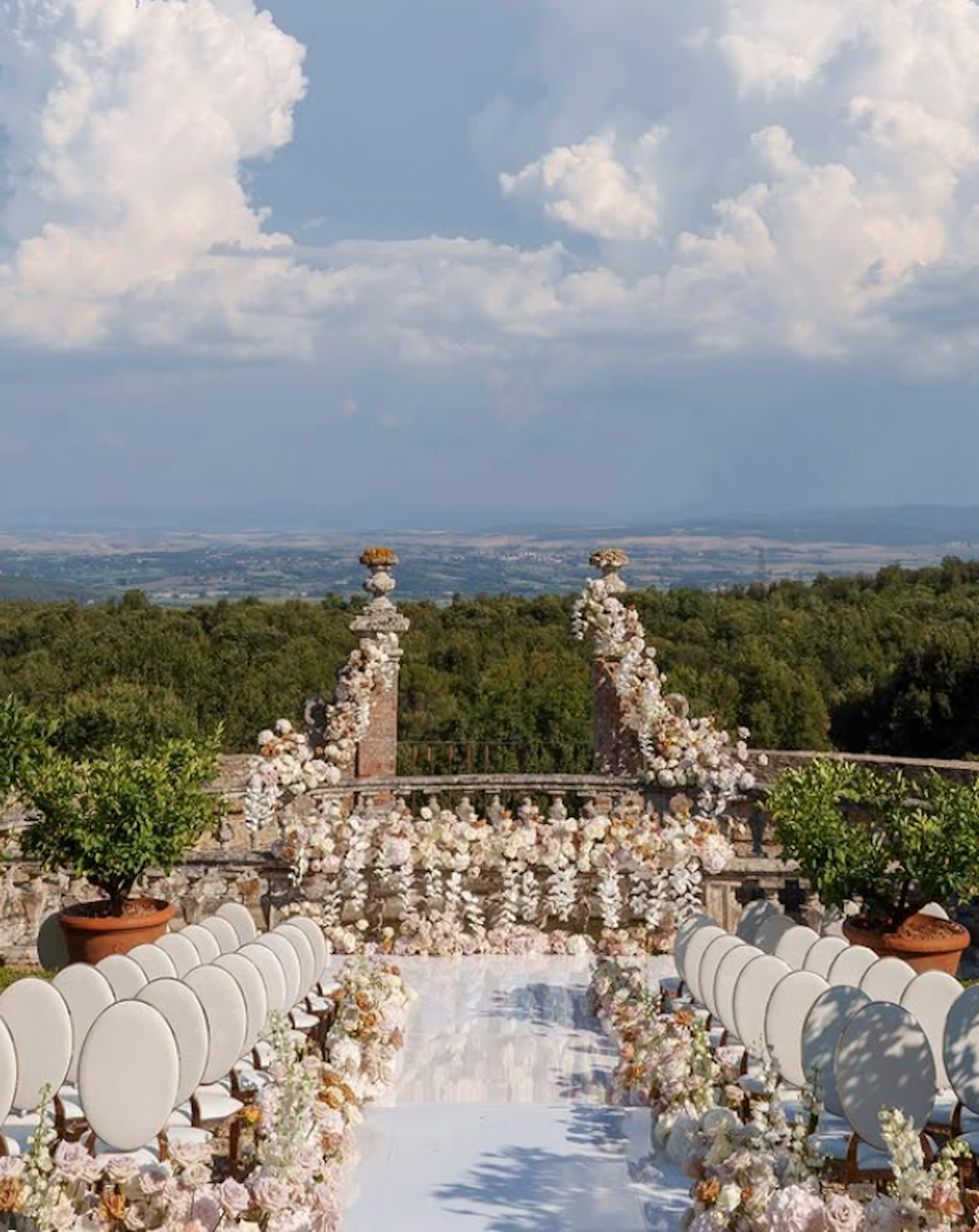A stunning white and rose flower setup at Castello di Celsa