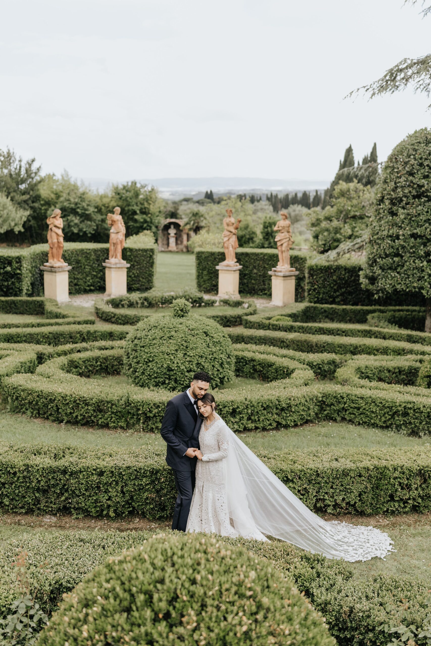 Bride and groom's hug in the garden