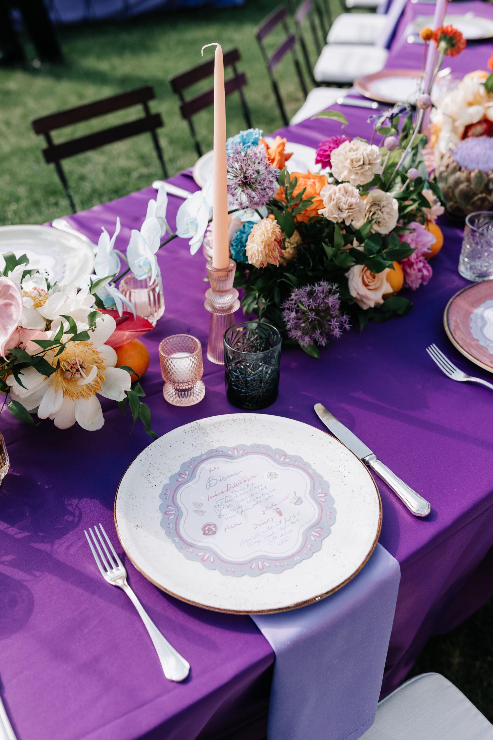 A violet and lilac wedding setup